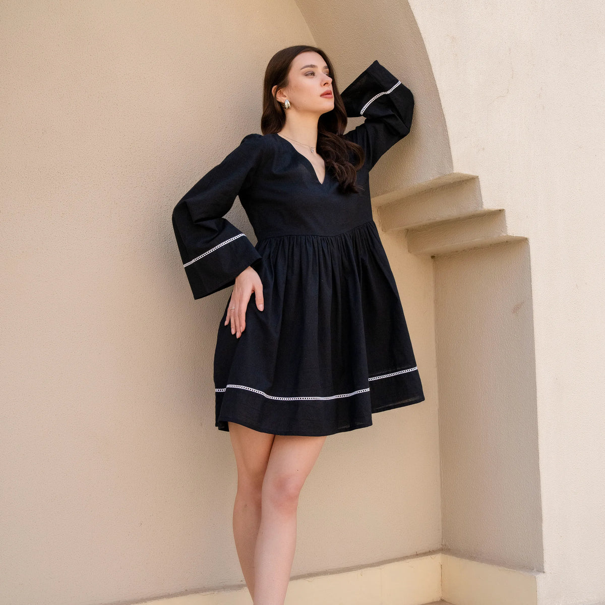 iris mini dress faithfull Wild Iris Flowy Black Mini Dress with Bell Sleeves